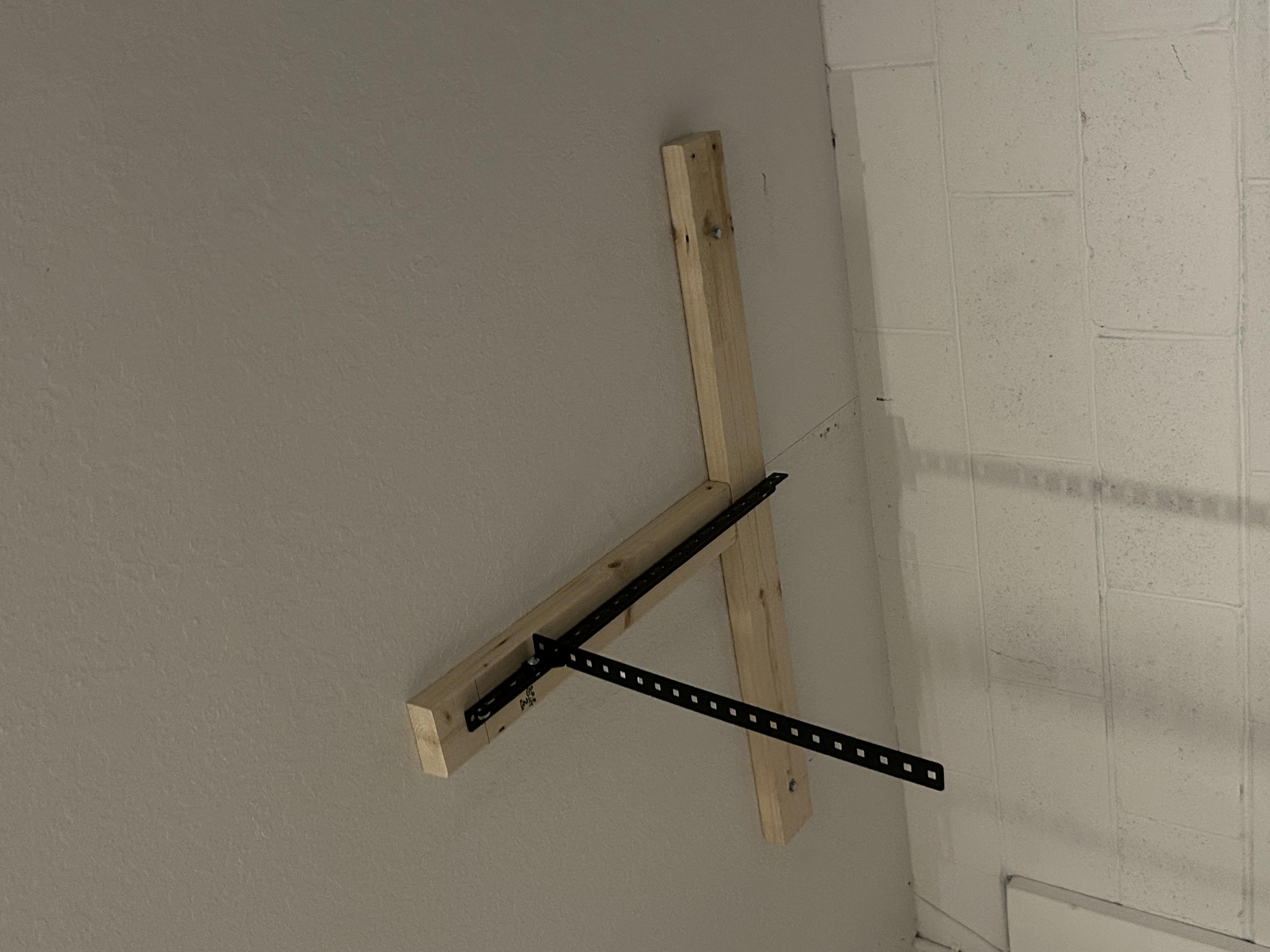 Ceiling mounted hanging shelves in the garage.