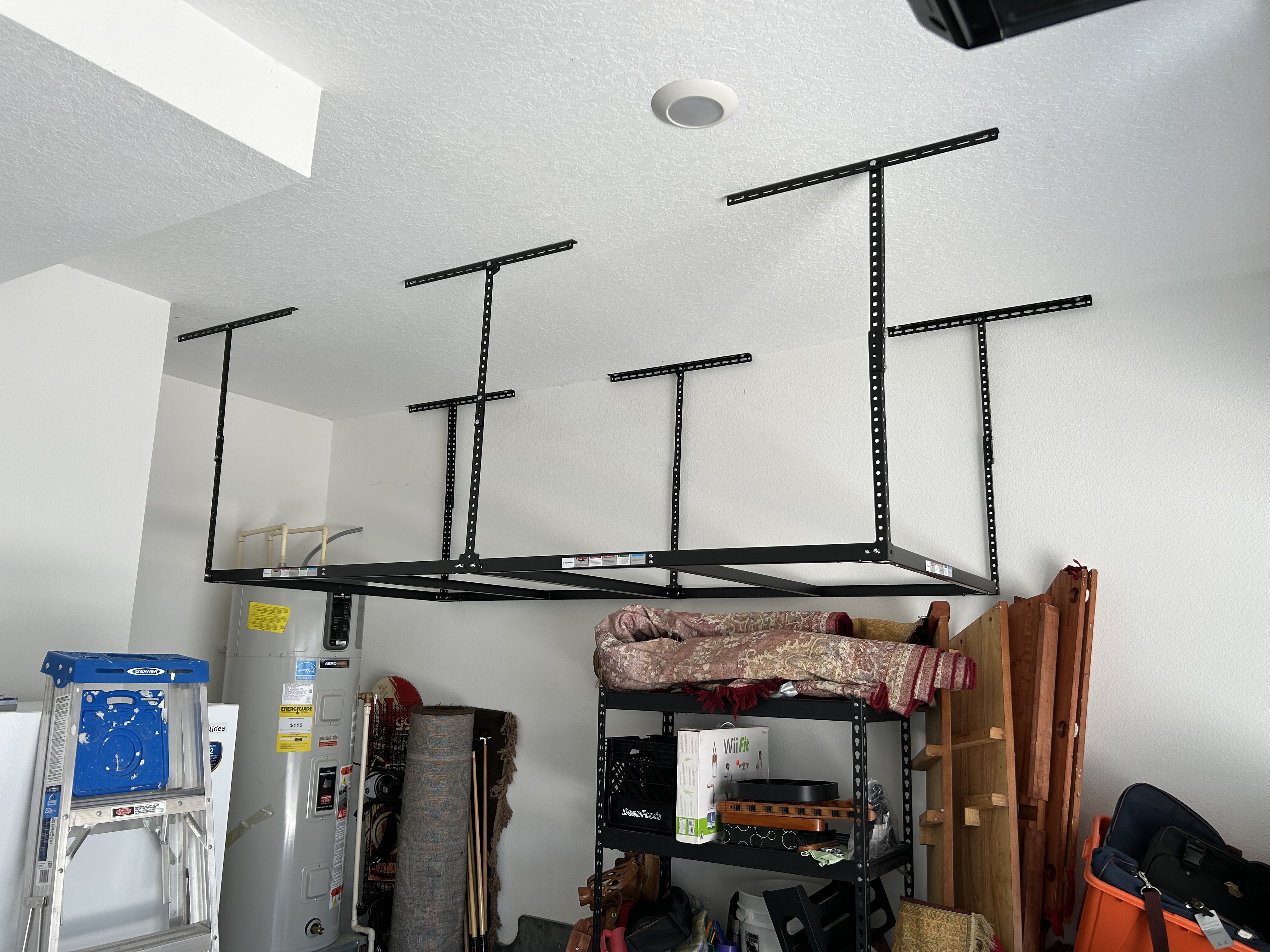 Ceiling mounted hanging shelves in the garage.