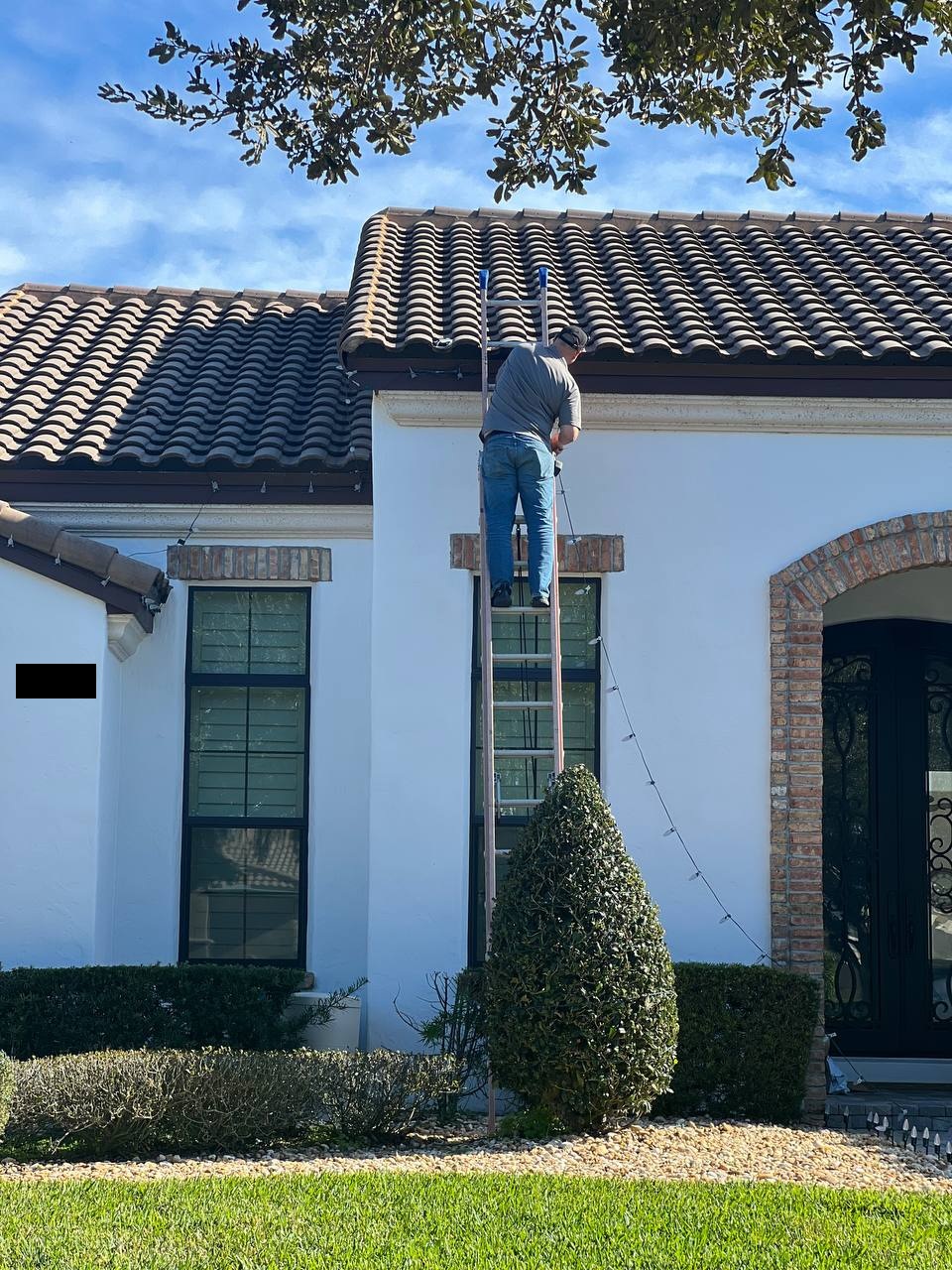 Holiday lighting along roofline