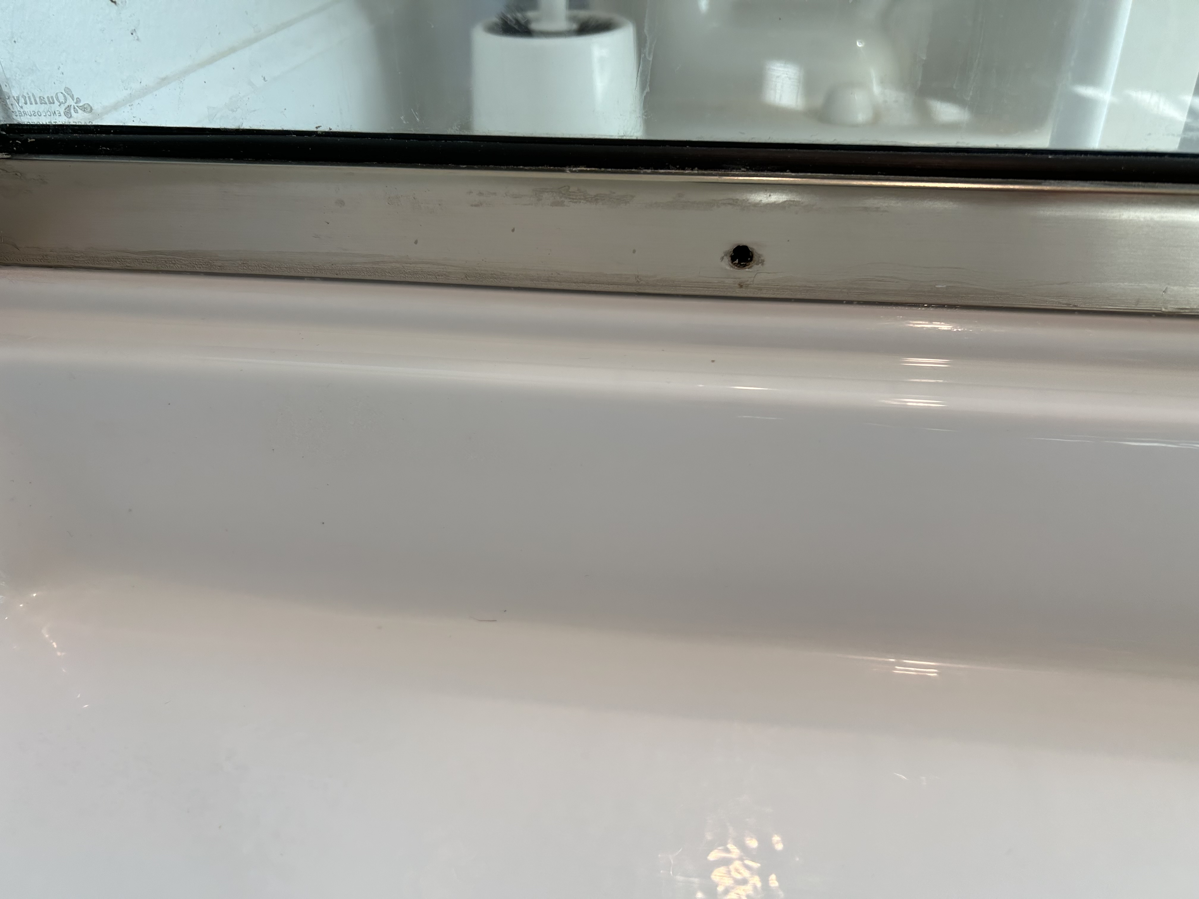 Caulking around shower pan