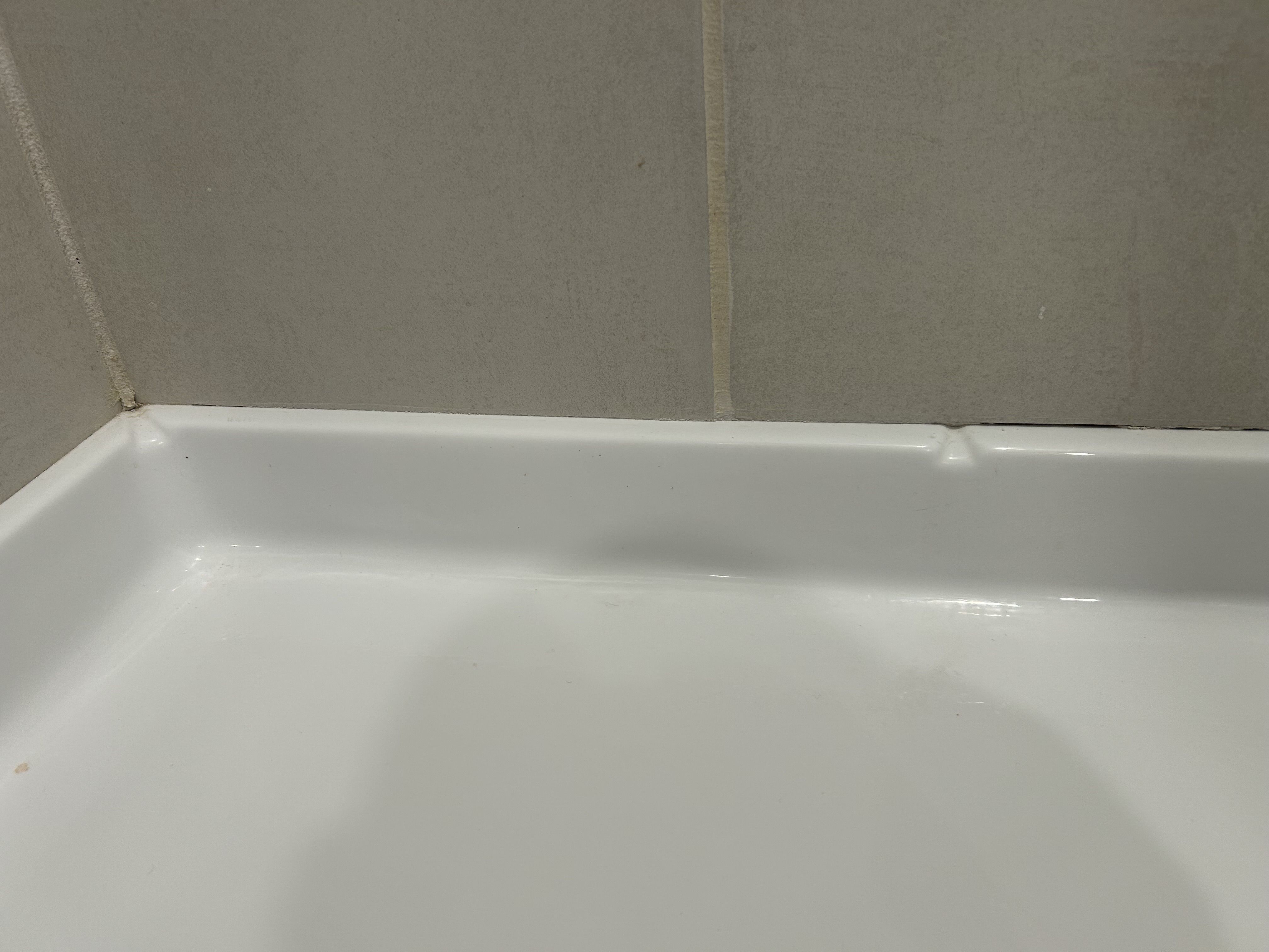 Caulking around shower pan
