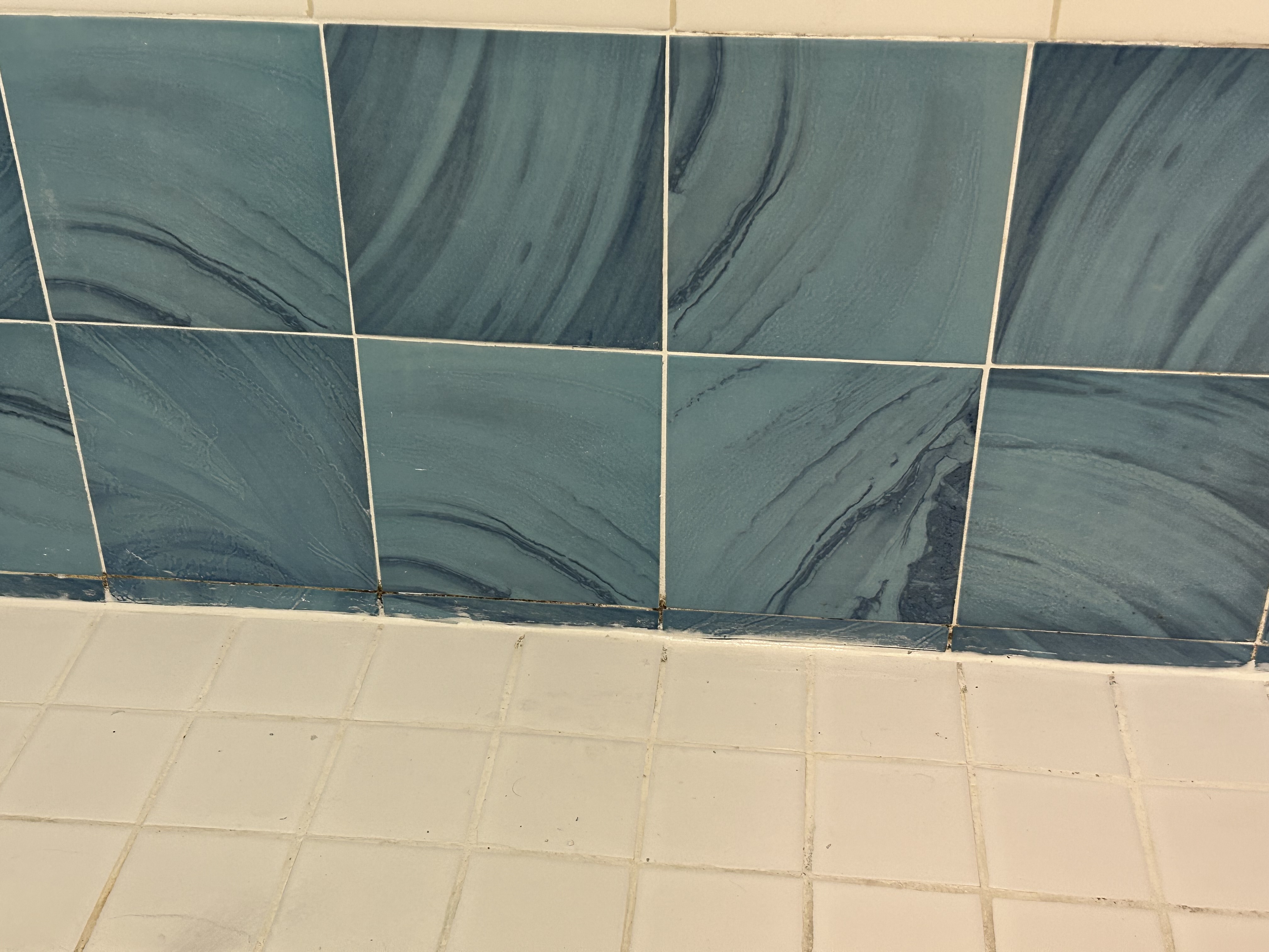 Caulking around shower pan