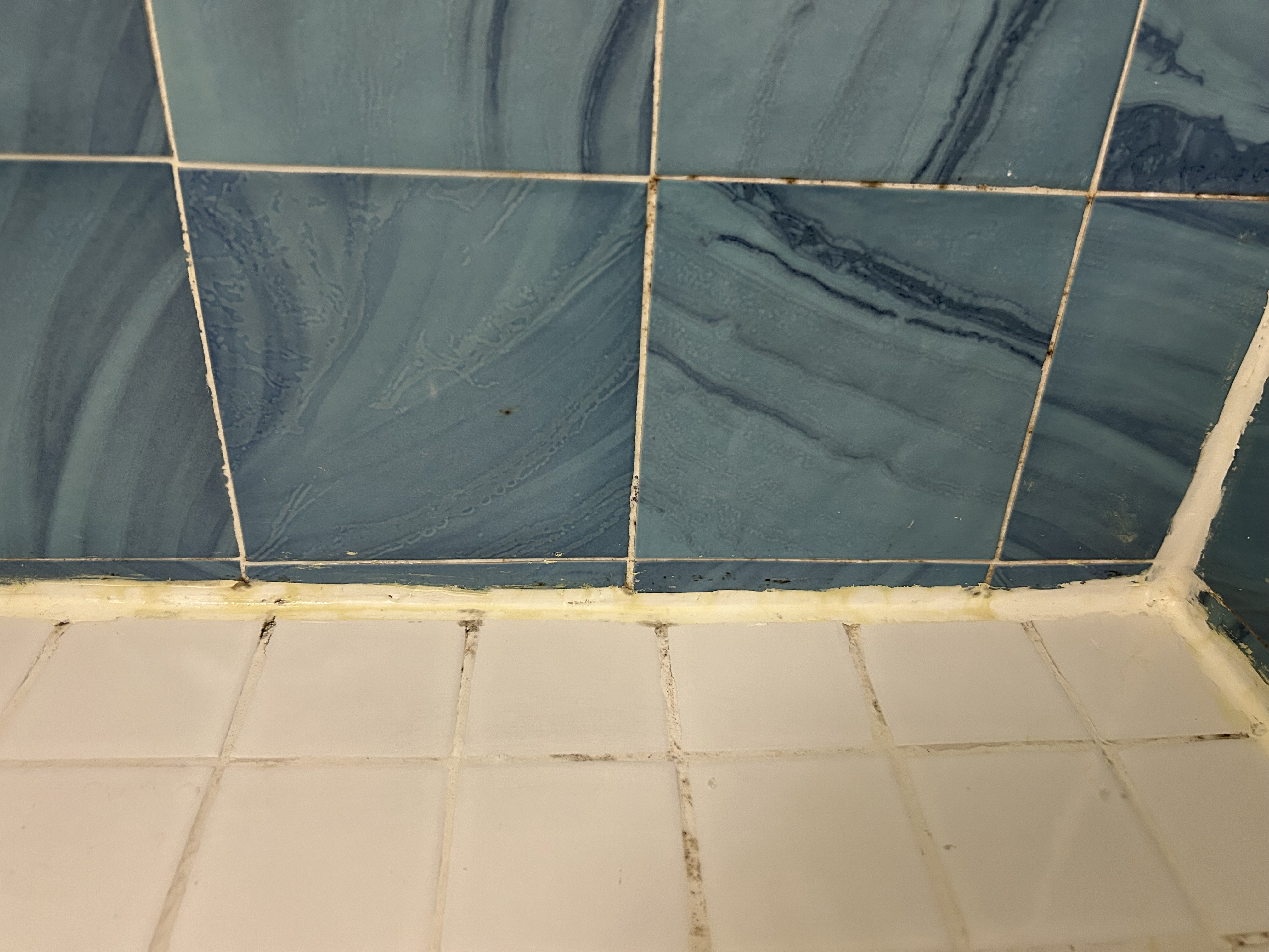 Caulking around shower pan